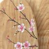 motif fleurs de cerisier japonais sur bois de poirier