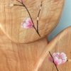 motif fleurs de cerisier japonais sur bois de poirier