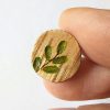 c6204ee6-7f86-4610-b0c2-8e0295e1022a Origine - Boucles d'oreilles puces en bois